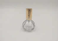 Goldenes Spray-Pumpen-Parfüm-Glasflasche rund mit dem kundengebundenen Logo-Druck